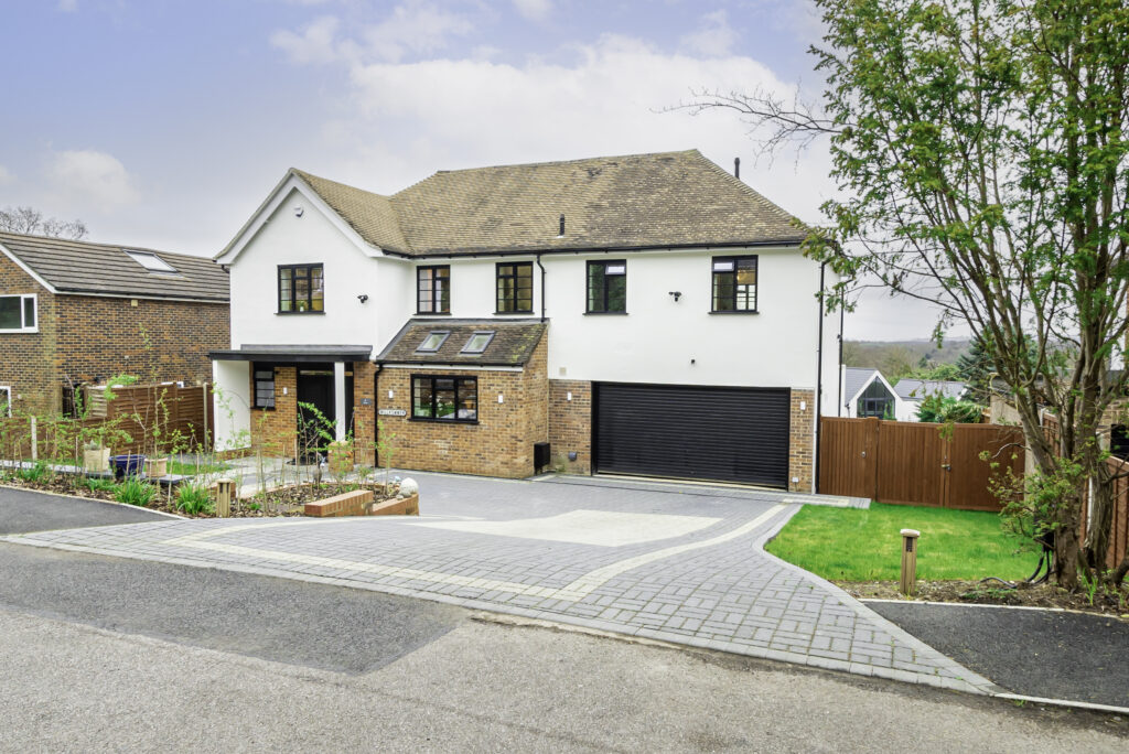Front view of a large family home in Woking